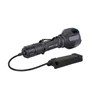 Black Olight Warrior X Turbo tactical flashlight with remote pressure switch.