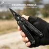 Gloved hand holding HX Outdoors black multitool pliers featuring ergonomic non-slip handles outdoors