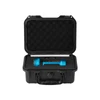 Blue diving flashlight in open hard case, black foam lining, white background.