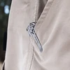 NexTool compact multitool with pocket clip secured on khaki pants pocket