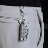 NexTool pocket multitool clipped to pants belt loop for everyday carry EDC lifestyle