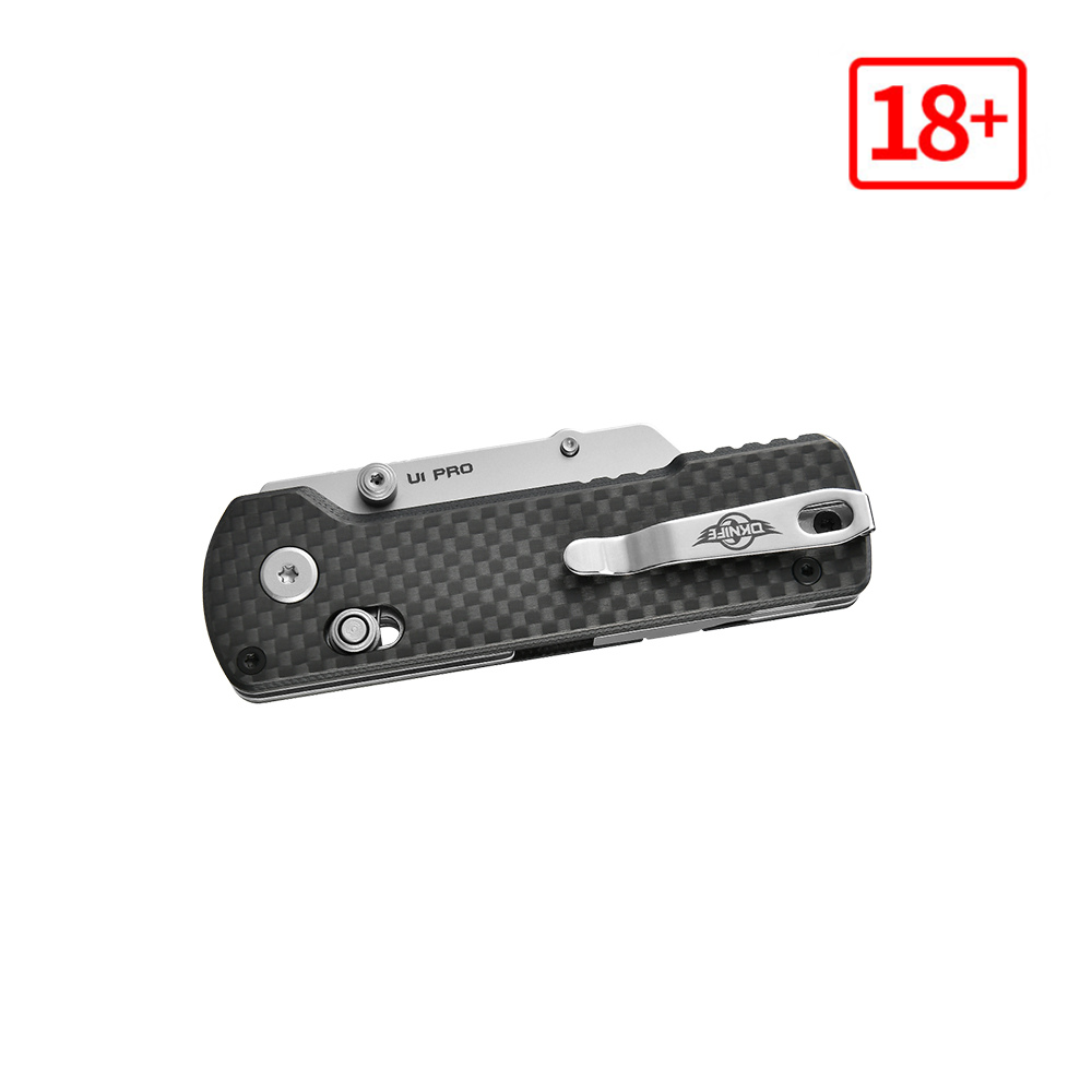 Olight U1 Pro carbon fiber folding knife with pocket clip, for EDC and outdoor activities.
