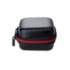 Black zippered carbon fiber texture hard case with red trim