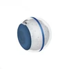 Spherical baby soother in blue and white with star, cloud patterns, and USB port.