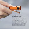 Olight Orange OCLIP PRO versatile clip light held in hand, demonstrating its portable illumination for work and daily use.