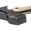 Close-up of a tactical axe textured hammer head pommel with tan handle scales and black steel construction