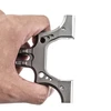 Hand holding a heavy-duty titanium alloy slingshot frame against a white background