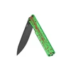 Green handle folding knife with red blood splatter pattern, black blade.