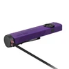 Purple Olight Arkfeld flat EDC flashlight charging with magnetic MCC cable on white background