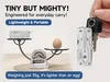 NexTool keychain multitool balancing with egg on scale showing 35g lightweight portable everyday carry design