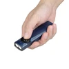 Olight blue Arkfeld Ultra held in hand, showing side button for EDC and outdoor use.