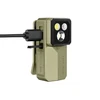 Olight green clip-on flashlight with USB charging cable plugged in, showcasing triple LED lights and compact design.