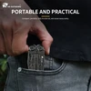 HX Outdoors compact black multitool being easily stowed into a gray jeans pocket for portable EDC use.