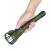 Olight Javelot Turbo 2 in olive green held in hand, showing its long-range spotlight capability.