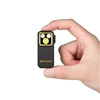 Olight Black Oclip Pro with gold bezel held in hand for portable clip-on lighting and hands-free use
