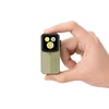 Hand holding compact green Olight EDC flashlight with triple LED lens on white background