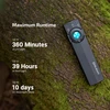 Olight Black ArkPro Lite Flashlight with blue button on mossy tree, showcasing long runtime for UV, Red, and Moonlight modes.
