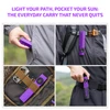Olight Purple ArkPro Flat Flashlight Clipped to Pocket Backpack and Tactical Gear for Everyday Carry Use