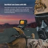 Tactical holographic red dot sight with sacrificial lens covers and ARD on a rifle during military training.
