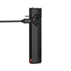 Olight Arkfeld Pro flat flashlight charging via USB-C cable showing green battery indicator lights