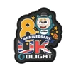 Olight 8th Anniversary UK PVC patch with mascot, stars, and Union Jack flag.