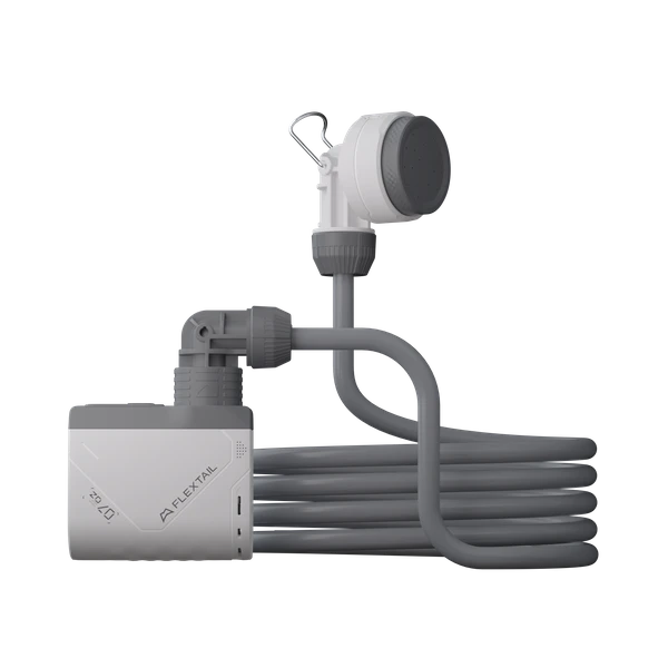 Portable camping shower pump kit with hose and nozzle, black background