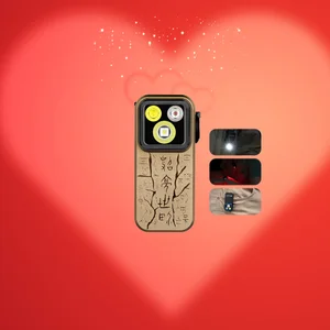 Olight Tan OCLIP PRO front view with etched pattern and multiple lights, a versatile clip light for everyday carry.