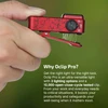 Olight Red OCLIP PRO versatile clip light with cracked pattern, held in hand, featuring 3 lighting options and durable clip for everyday use.