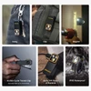 Olight Black Oclip Pro keychain with three light sources and gold trim for everyday carry.