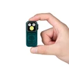 Olight Green Oclip Pro in Hand with Bright LED and Decorative Pattern for Everyday Carry Lighting