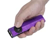 Olight Purple ArkPro Flat Flashlight Handheld Close Up with Laser and UV Light Selector Switch for Everyday Carry