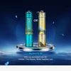 Two Olight i3E EOS keychain flashlights in blue and gold patterned finishes on a display podium for a promotional giveaway